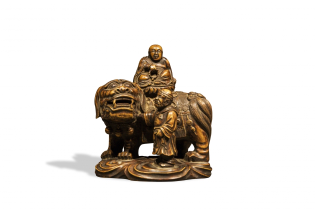 清·黄杨木雕胡人戏狮佛像